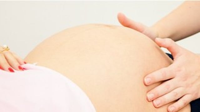 A piece of cloth was found on the body of a woman who had just given birth