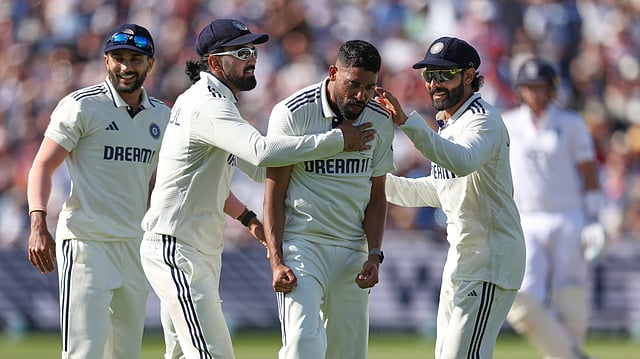 Mohammed Siraj, celebrates with teammates after the dismissal of England's Zak Crawley