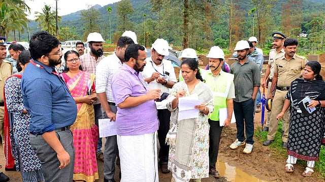 Churalmala, Mundakai landslides minister k rajan visit Construction work on the model house in the township being built at Elston Estate