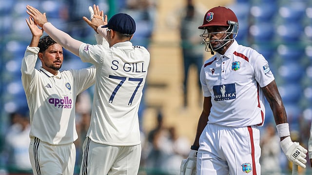 Kuldeep Yadav celebrates after taking a wicket
