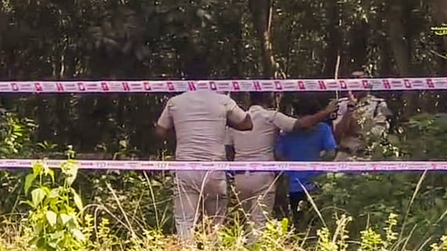West Bengal Police personnel during reconstruction of the crime scene