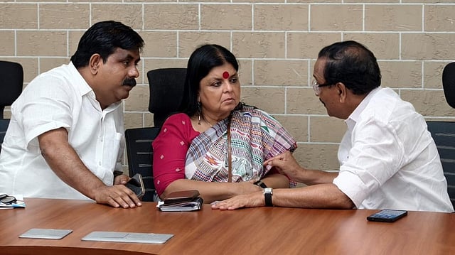 Congress Leaders K Praveen Kumar, Deepa das Munshi