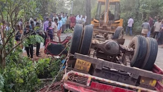 Two people died after a lorry carrying a concrete mixer overturned in Payyavoor