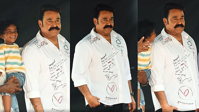 'ലാലേട്ടന് ആ കുട്ടിയുടെ മുഖത്തേക്ക് നോക്കി ഒന്ന് ചിരിക്കാമായിരുന്നു'; ഫാൻസ് ഫോട്ടോഷൂട്ടിന് പിന്നാലെ നടന് വിമർശനം