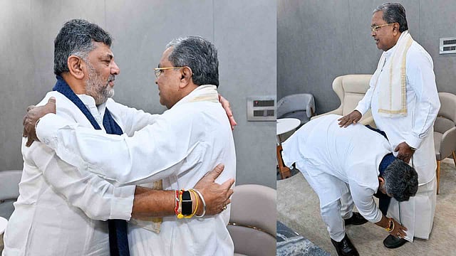 സിദ്ധരാമയ്യയെ കെട്ടിപ്പുണര്ന്ന് ഡി കെ ശിവകുമാര്, കാല്തൊട്ടു വണങ്ങി അനുഗ്രഹം തേടി, പ്രഭാത വിരുന്നിലെ ഊഷ്മളരംഗങ്ങള് ( വീഡിയോ)