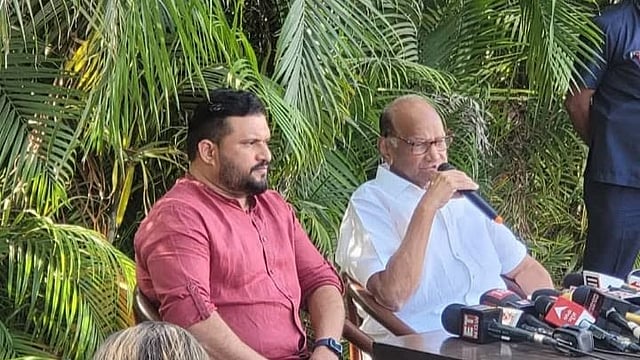 Mohammed Faizal Padippura with Sharad Pawar