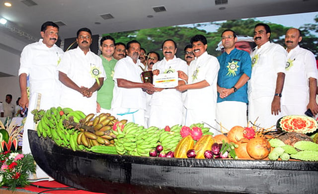 Peruvayal Raman receives the Kerala State Farmers? Award from Chief Minister V. D. Satheesan.