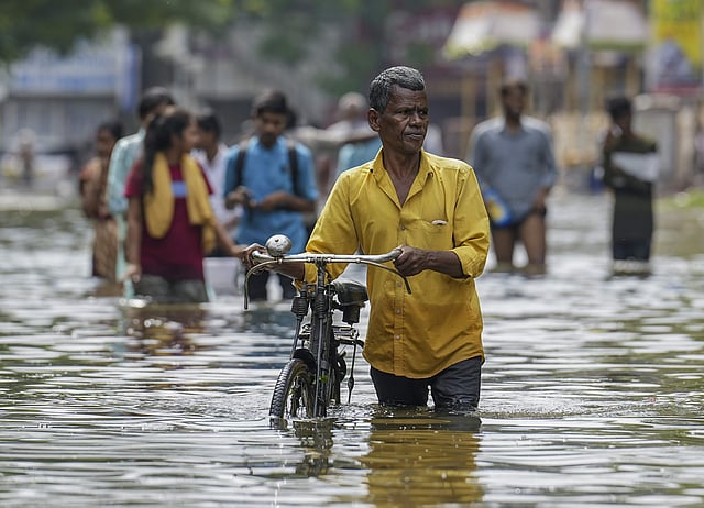 റോഡ് പുഴയായപ്പോള്/ പിടിഐ