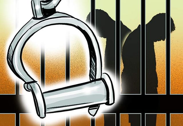 drawing of handcuffs and sillhoute of two persons inside a prison