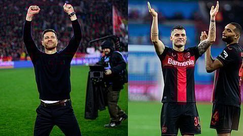 ലെവര്‍കൂസന്‍ പരിശീലകന്‍ സാബി അലോണ്‍സോ, മധ്യനിരയിലെ നിര്‍ണായക താരം ഗ്രനിത് സാക എന്നിവര്‍ വിജയ ശേഷം ആരാധകരെ അഭിവാദ്യം ചെയ്യുന്നു