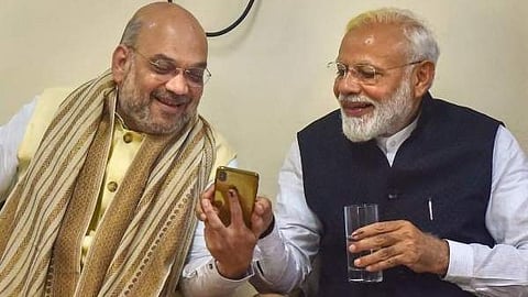 പ്രധാനമന്ത്രി നരേന്ദ്ര മോദി, ആഭ്യന്തര മന്ത്രി അമിത് ഷാ 