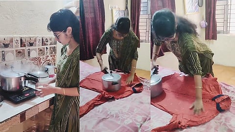 കുക്കര്‍ ഉപയോഗിച്ച് തുണി തേച്ച് വീട്ടമ്മ