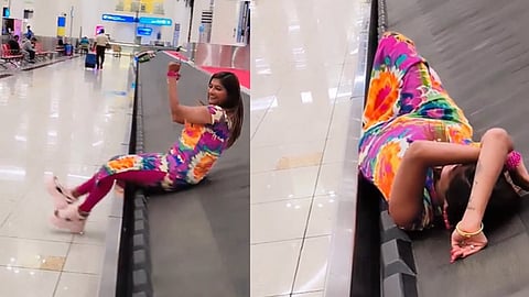 ബാ​ഗേജ് കറൗസലിന് മുകളിൽ കിടന്ന് യുവതിയുടെ ഷോ