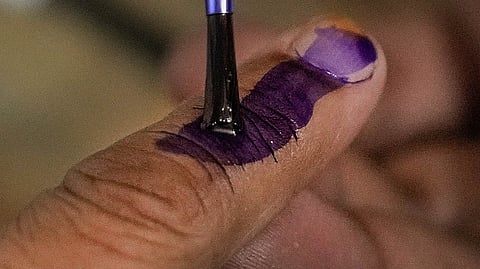 local body byelection ink on middle finger
