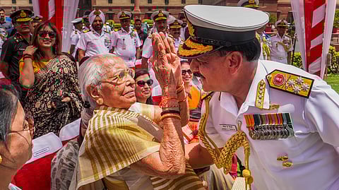 Admiral Dinesh Kumar Tripathi takes blessings