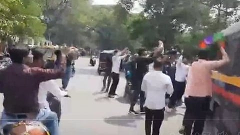 Pune accident Protesters throw ink at police van carrying father of minor