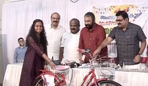avanthika-got-new-cycle-as-a-gift-from-education-minister-v-sivankutty