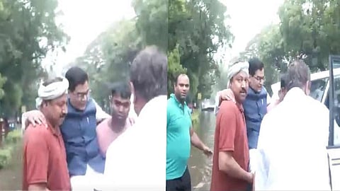 samajwadi party MP Ramgopal Yadav carried by helpers to the car amid monsoon in delhi water logging