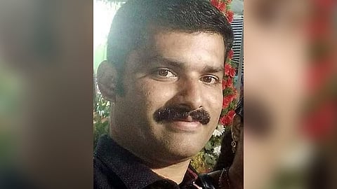 young man hacked to death by a neighbor