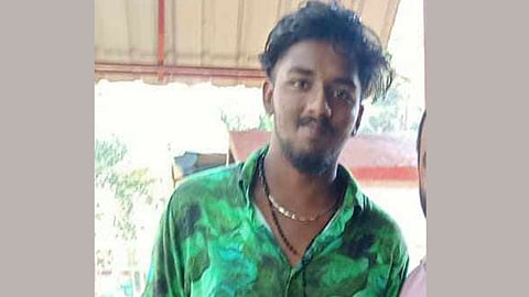 collided with a private bus biker died