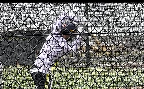 Gill returns to nets after recovering from thumb injury .