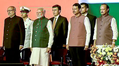Narendra Modi, Governor CP Radhakrishnan, Devendra Fadnavisduring the swearing in ceremony