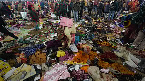 Stranded devotees are seen after a stampede occurred at Sangam on 'Mauni Amavasya' during the ongoing 'Maha Kumbh Mela' festival, in Prayagraj