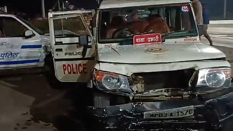 ഇടിച്ചിട്ട പൊലീസ് വാഹനം