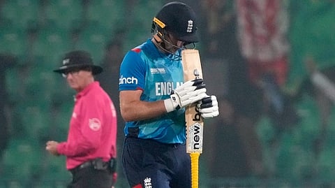 England's Joe Root reacts as he walks off the field after his dismissal during the ICC Champions Trophy cricket 