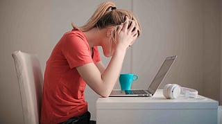 WOMAN WORKING STRESS