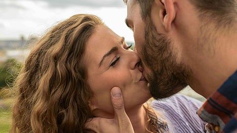 couple kisses