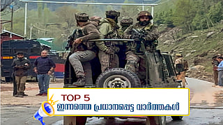 Security personnel move towards the site after terrorists attacked a group of tourists at Pahalgam