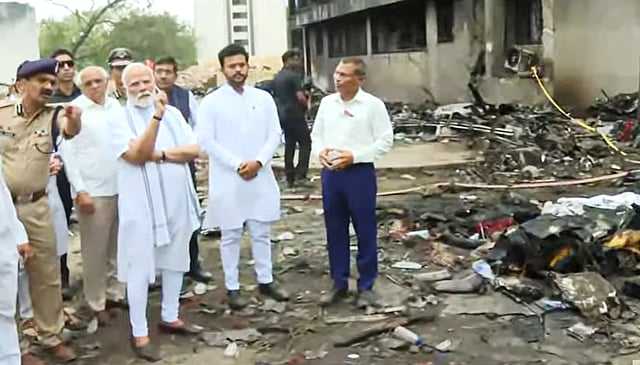  Prime Minister Narendra Modi visits the site of yesterday's Air India plane crash, in Ahmedabad