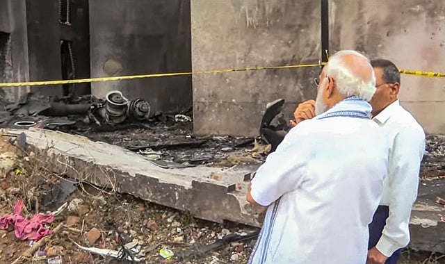  Prime Minister Narendra Modi visits the site of yesterday's Air India plane crash, in Ahmedabad