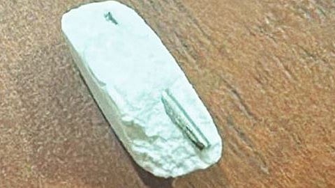 metal piece in tablet