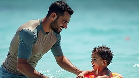 a kid playing in water with safety precautions 