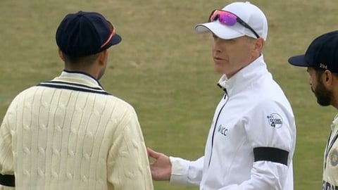 Captain Gill complains to the umpire