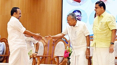 Leader of the opposition VD Satheesan greets Chief Minister Pinarayi Vijayan and speaker AN Shamseer