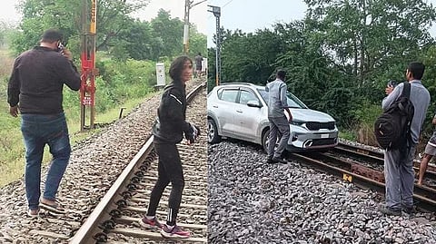 Woman drives car on railway track near Hyderabad, train traffic disrupted .