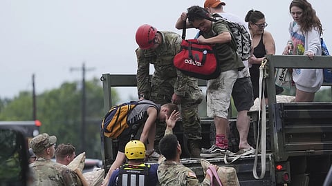 Texas crippled by unprecedented rain: 13 dead