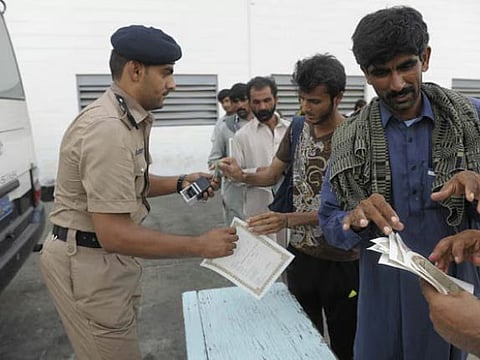 oman police and labors 