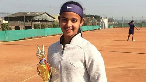 Indian Tennis Player Radhika Yadav with trophy