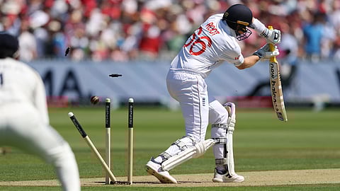 Joe Root is clean bowled by Jasprit Bumrah