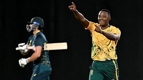 Kagiso Rabada celebrates after dismissing Tim David