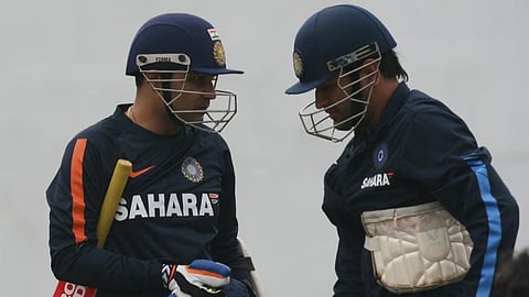 Sehwag and Dhoni during training