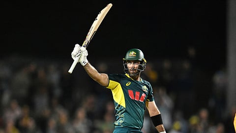 Glenn Maxwell celebrates his half century