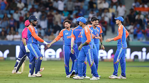 India's Kuldeep Yadav, left, celebrate the wicket 