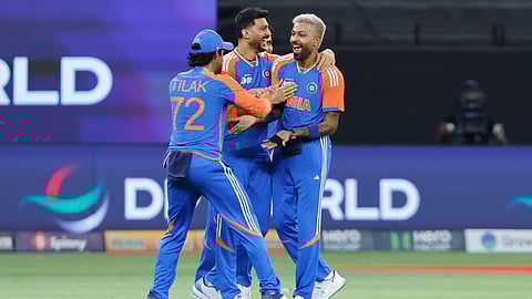 Hardik Pandya celebrates his wicket with his teammates