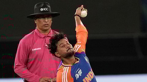 India's Kuldeep Yadav bowls a delivery during the Asia Cup
