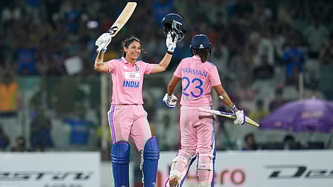 India's Smriti Mandhana, celebrates her century with captain Harmanpreet Kaur 